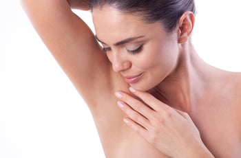 woman_showing_smooth_underarm_armpit_867553524